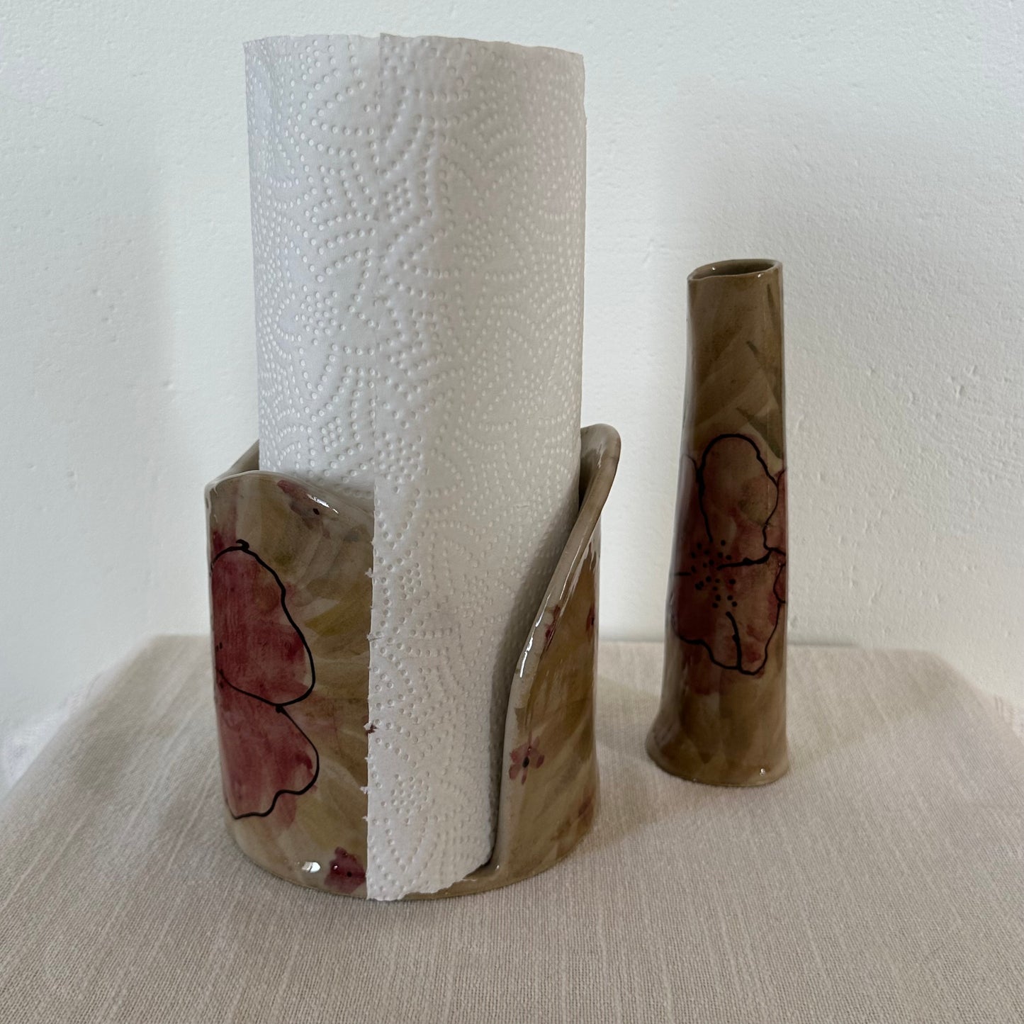 Hushållspappershållare