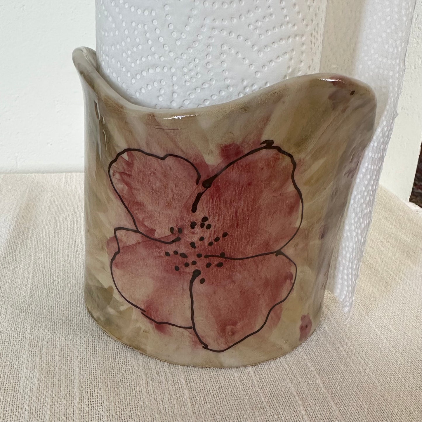 Hushållspappershållare