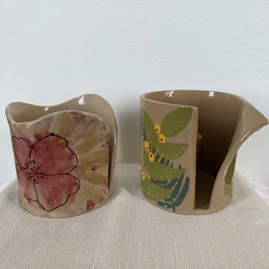 Hushållspappershållare